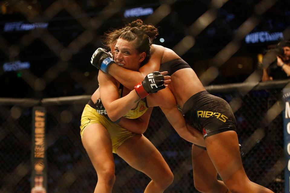 Oct 12, 2019; Tampa, FL, USA; Mackenzie Dern (red gloves) fights Amanda Ribas (blue glove) during UFC Fight Night at Amalie Arena. Mandatory Credit: Reinhold Matay-USA TODAY Sports