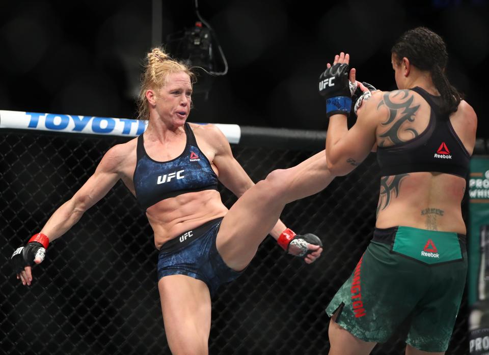 January 18, 2020; Las Vegas, Nevada, USA; Holly Holm moves in with a kick against Raquel Pennington during UFC 246 at T-Mobile Arena. Mandatory Credit: Mark J. Rebilas-USA TODAY Sports