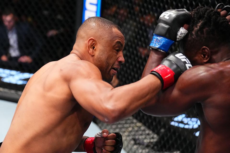 LAS VEGAS, NEVADA - JANUARY 11: (L-R) Cesar Almeida of Brazil punches Abdul Razak Alhassan of Ghana in a middleweight fight during the UFC Fight Night event at UFC APEX on January 11, 2025 in Las Vegas, Nevada. (Photo by Chris Unger/Zuffa LLC via Getty Images)