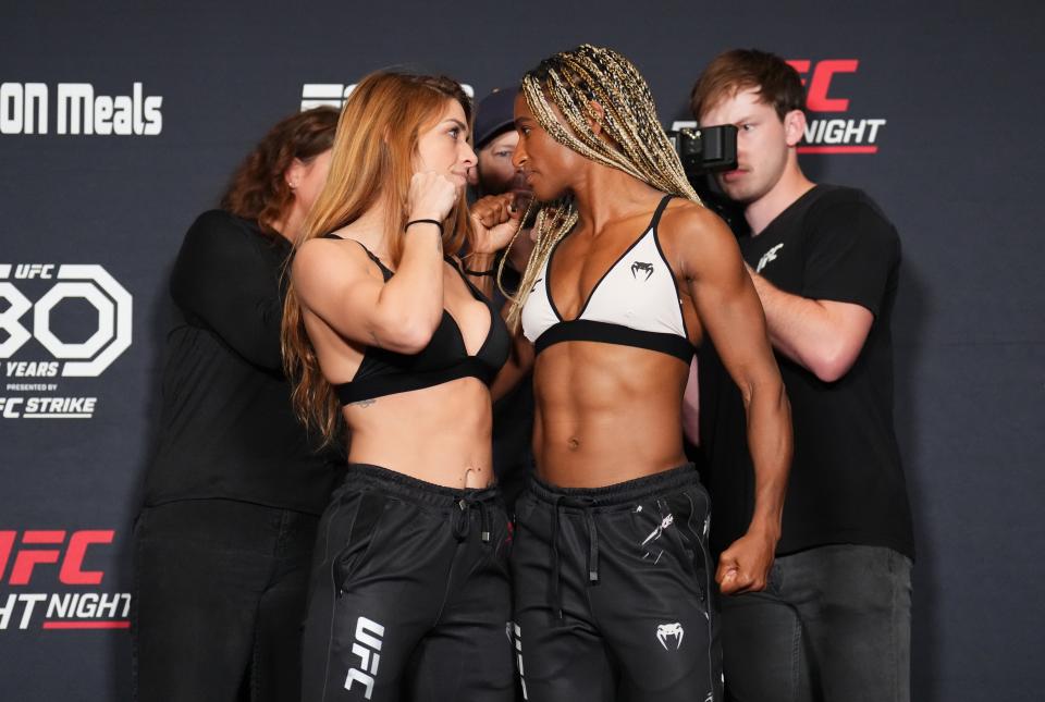 LAS VEGAS, NEVADA - MAY 19: (L-R) Opponents Mackenzie Dern and Angela Hill face off during the UFC weigh-in at Santa Fe Station Hotel and Casino on May 19, 2023 in Las Vegas, Nevada. (Photo by Chris Unger/Zuffa LLC via Getty Images)