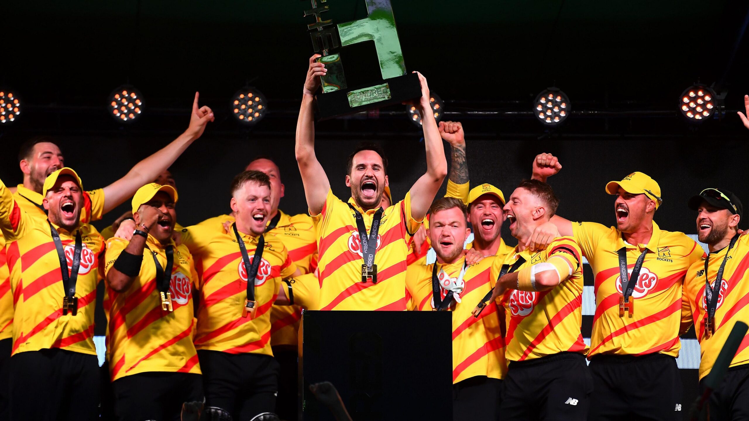 Trent Rockets players celebrating with the trophy after winning The Hundred in 2022