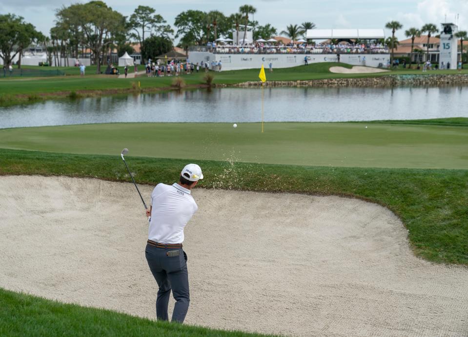 Austin Eckroat hits his second shot on the16th hole where fewer fans attended the Monday finish of the Cognizant Classic in The Palm Beaches at PGA National Resort & Spa on March 4, 2024 in Palm Beach Gardens, Florida.