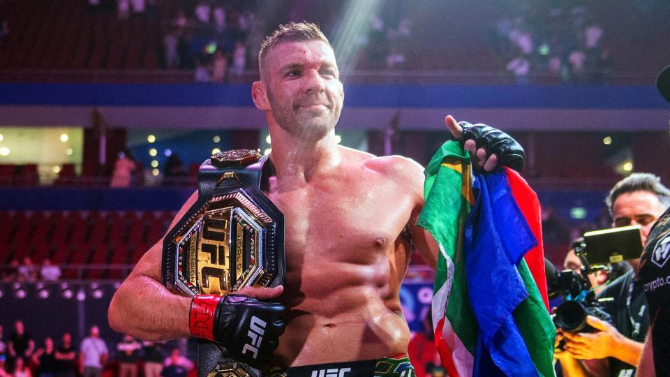 MMA - UFC 312 - Dricus Du Plessis v Sean Strickland - UFC Middleweight Title - Qudos Bank Arena, Sydney Olympic Park, Sydney, Australia - February 9, 2025 Dricus Du Plessis celebrates winning with the belt after defending his UFC Middleweight Title against Sean Strickland REUTERS/Jeremy Piper     TPX IMAGES OF THE DAY