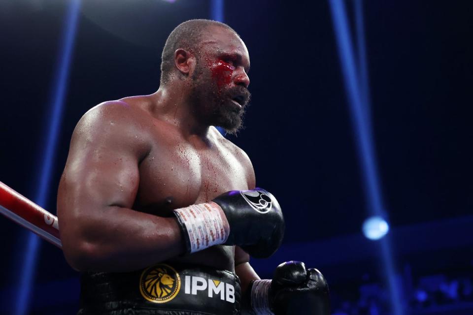 Derek Chisora, with a cut and blood on his face, looks on while fighting Otto Wallin (Getty Images)