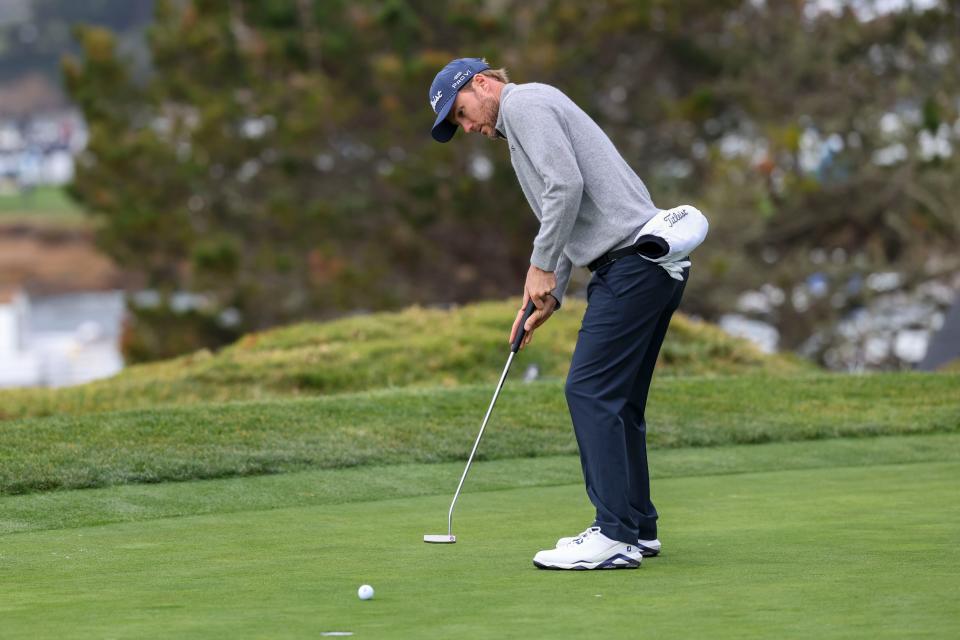 Russell Henley putts on the fourth hole during the third round of the AT&T Pebble Beach Pro-Am golf tournament at Pebble Beach Golf Links.