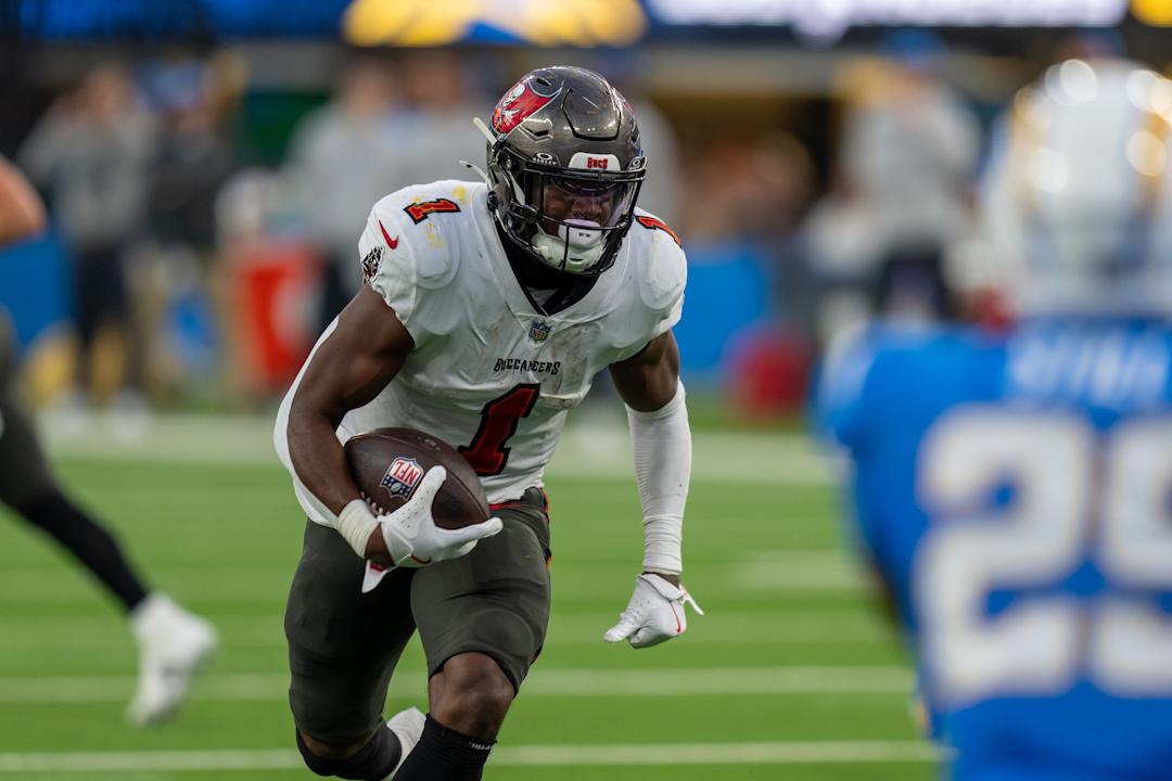 LOS ANGELES, CA - DECEMBER 15: Rachaad White #1 of the Tampa Bay Buccaneers runs the ball during a game between Tampa Bay Buccaneers and Los Angeles Chargers at SoFi Stadium on December 15, 2024 in Los Angeles, California. (Photo by Melinda Meijer/ISI Photos/Getty Images)