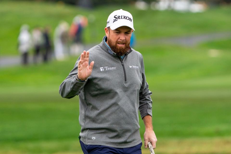 Shane Lowry acknowledges the crowd after making his putt on the second hole during the third round of the AT&T Pebble Beach Pro-Am golf tournament at Pebble Beach Golf Links.