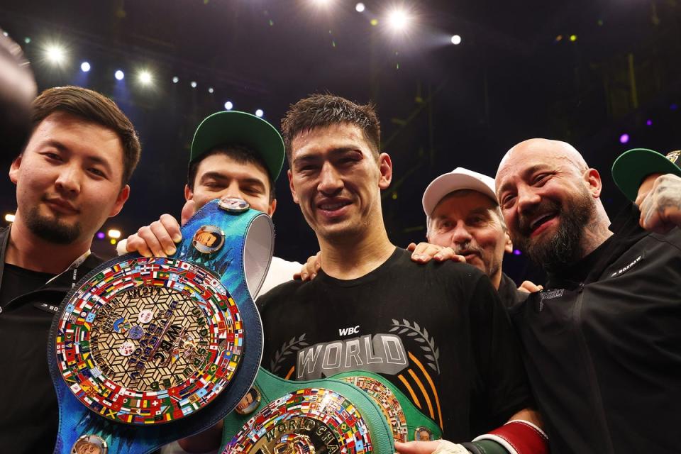 Bivol and his team celebrate their undisputed title win (Getty Images)