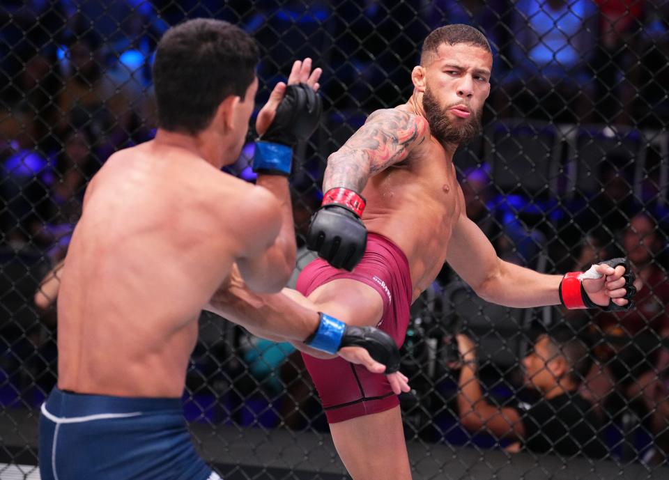 LAS VEGAS, NEVADA - SEPTEMBER 20: (R-L) Roybert Echeverria of Venezuela kicks Jafel Filho of Brazil in a flyweight fight during Dana White's Contender Series season six week nine at UFC APEX on September 20, 2022 in Las Vegas, Nevada. (Photo by Chris Unger/Zuffa LLC)