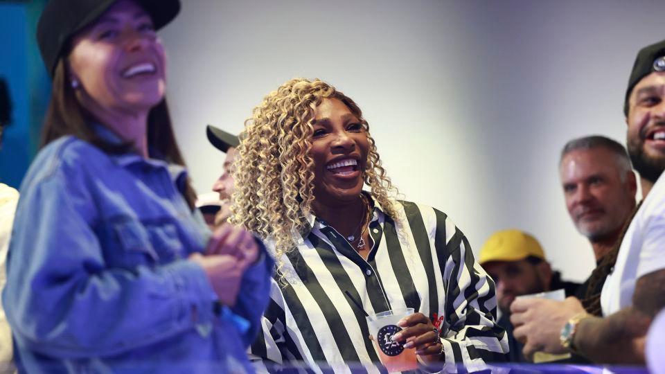 Williams laughs watches the TGL match between LA and New York in Palm Beach Gardens, Florida. - Carmen Mandato/TGL/Getty Images