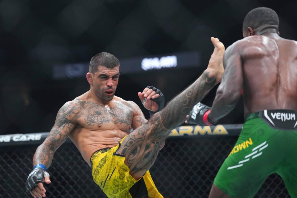 Jun 1, 2024; Newark, New Jersey, USA; Randy Brown (red gloves) fights Elizeu Zaleski Dos Santos (blue gloves) during UFC 302 at Prudential Center. Mandatory Credit: Joe Camporeale-USA TODAY Sports