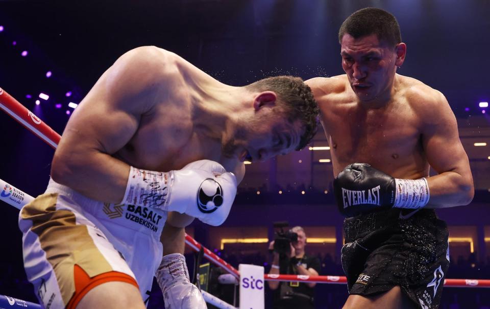 Vergil Ortiz Jr (right) grew into his fight with Israil Madrimov and retained his interim belt (Getty)