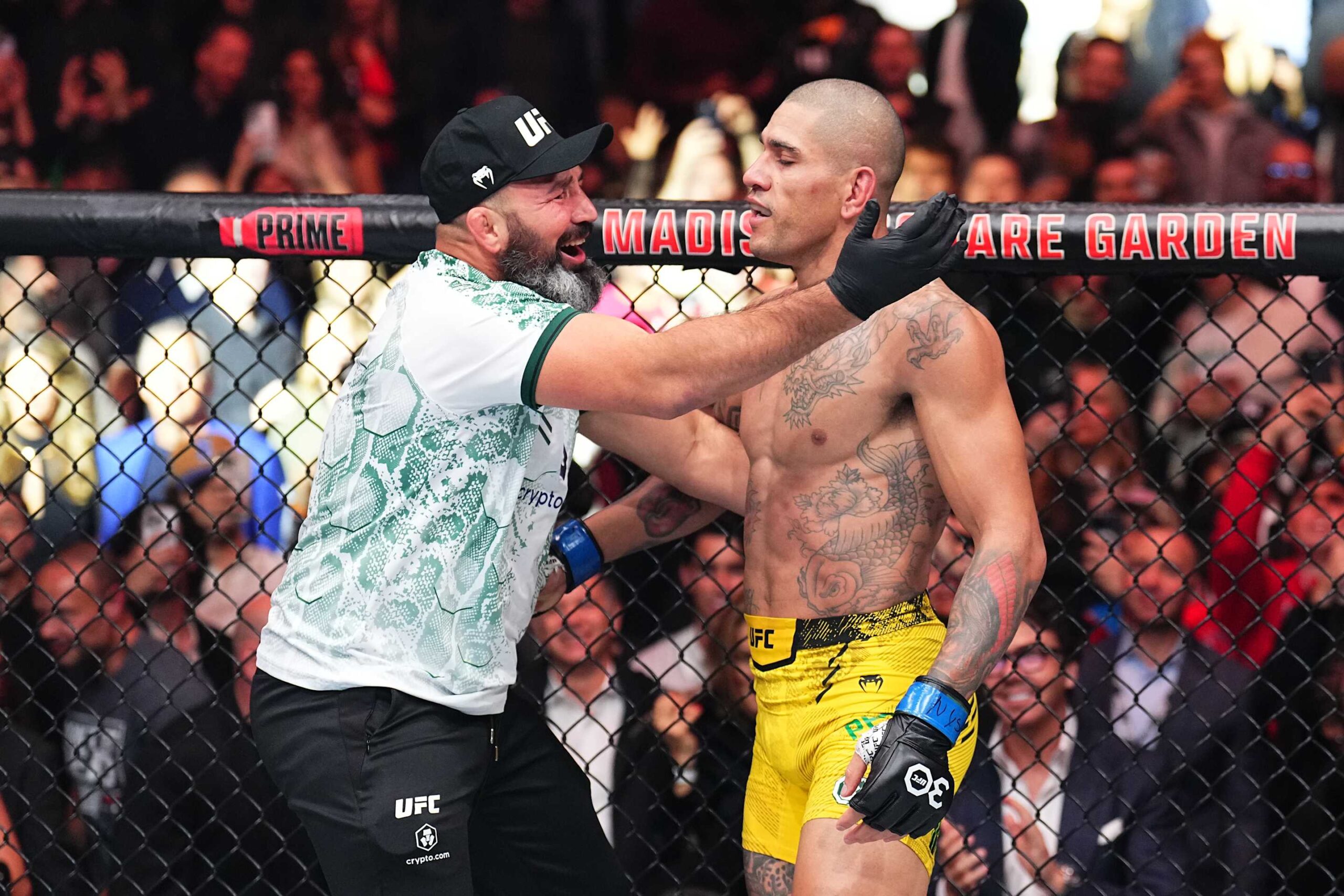 NEW YORK, NEW YORK - NOVEMBER 11: Alex Pereira of Brazil celebrates with Glover Teixeira after defeating Jiri Prochazka of the Czech Republic by TKO in the UFC light heavyweight championship fight during the UFC 295 event at Madison Square Garden on November 11, 2023 in New York City. (Photo by Chris Unger/Zuffa LLC via Getty Images)