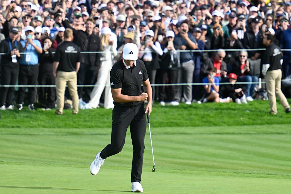 Ludvig Aberg pumps his fist after making a birdie putt on the 18th hole to win the 2025 Genesis Invitational at Torrey Pines.