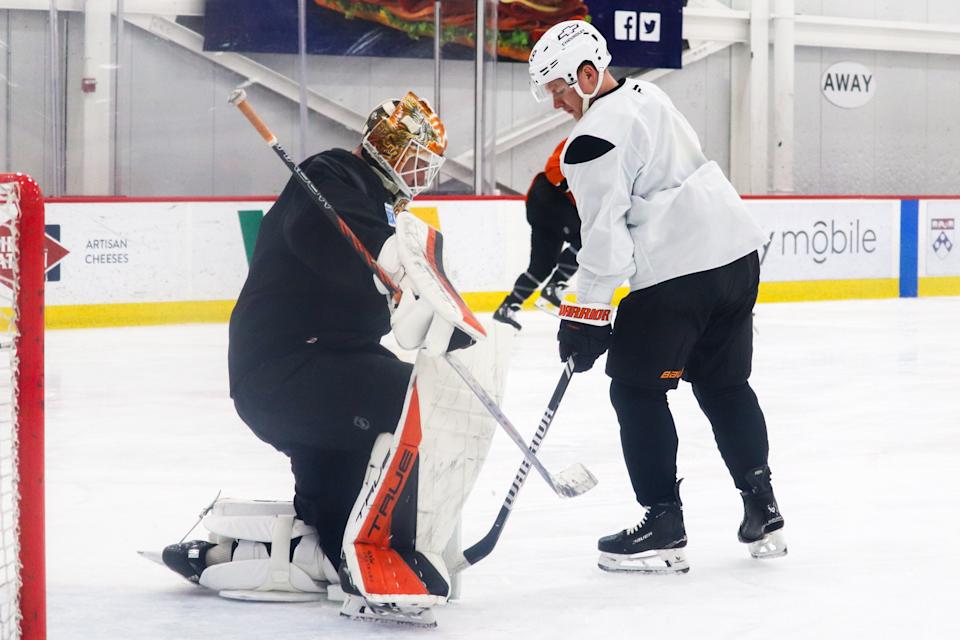 Philadelphia Flyers winger Matvei Michkov (39) shoots on goaltender Ivan Fedotov (82) in practice on Feb. 26, 2025. (Megan DeRuchie-The Hockey News)