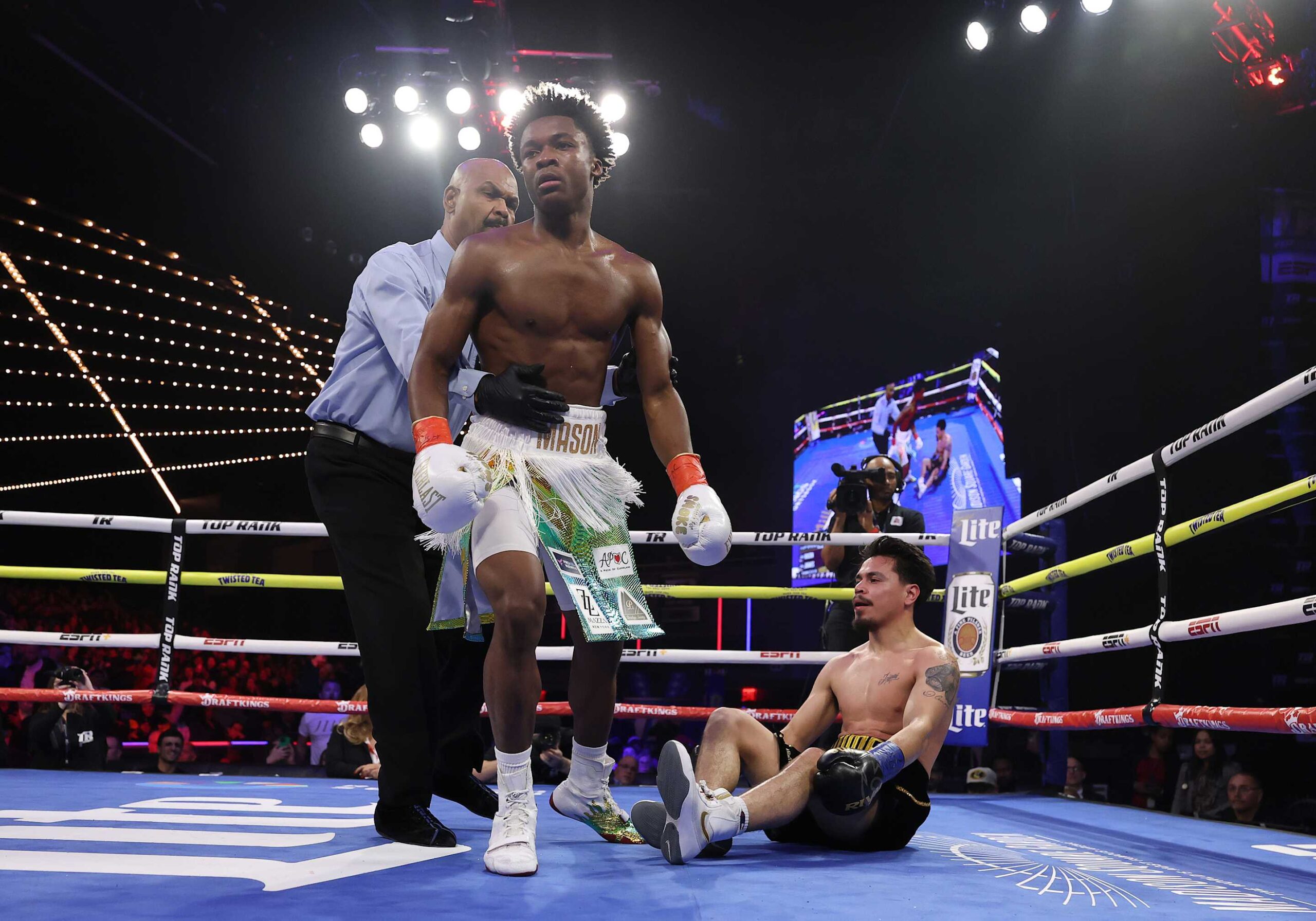 NEW YORK, NEW YORK - FEBRUARY 14:  Abdullah Mason knocks down Manuel Jaimes in the second round during their lightweight fight during their welterweight fight, during their heavyweight fight at The Theater at Madison Square Garden on February 14, 2025 in New York City. (Photo by Al Bello/Getty Images)