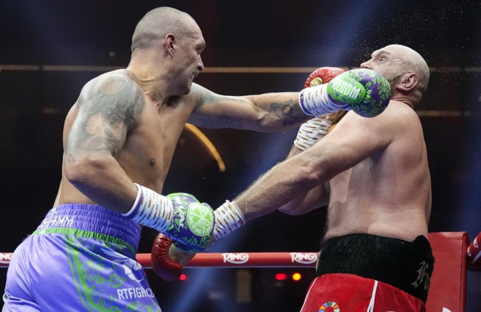 Oleksandr Usyk (left) beat Tyson Fury twice in 2024 to stay unbeaten (PA Wire)