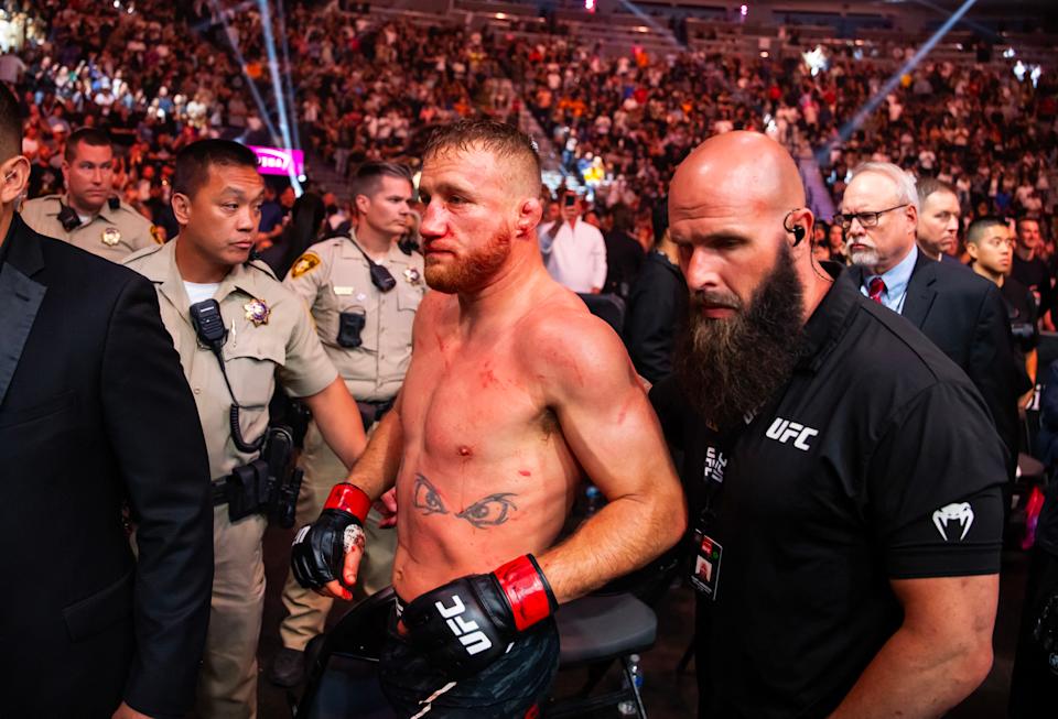 Apr 13, 2024; Las Vegas, Nevada, USA; Justin Gaethje leaves the octagon after being knocked out by Max Holloway (not pictured) during UFC 300 at T-Mobile Arena. Mandatory Credit: Mark J. Rebilas-USA TODAY Sports