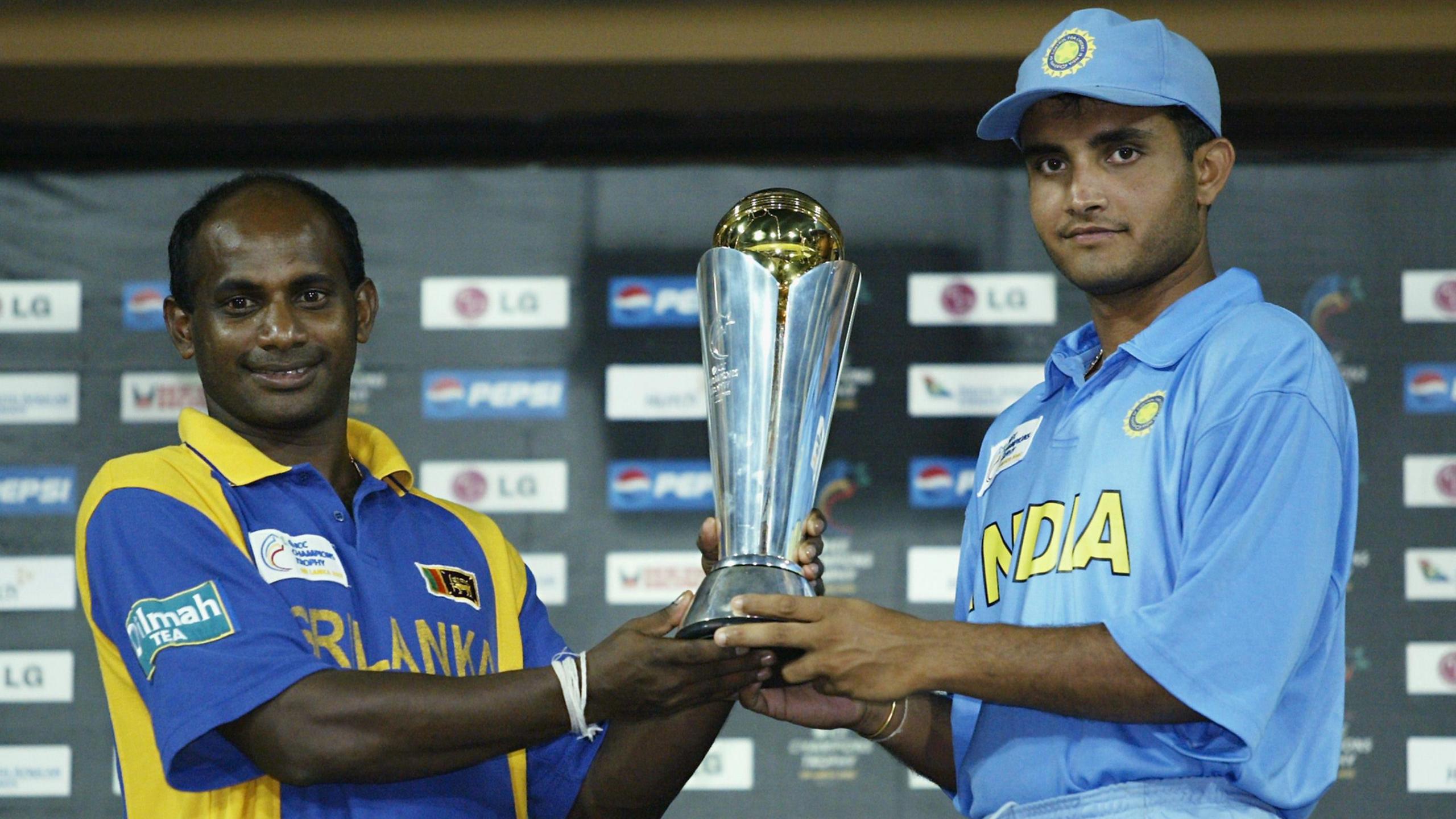 Sri Lanka captain Sanath Jayasuriya and India captain Sourav Ganguly share the 2002 Champions Trophy tournament