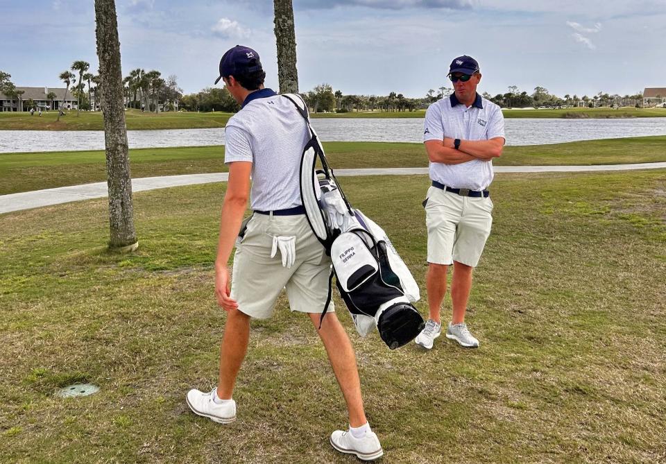 University of North Florida golf coach Scott Schroeder (right) talks with Opsreys' player Filippo Serra during the 2024 Hayt, at the Sawgrass Country Club.