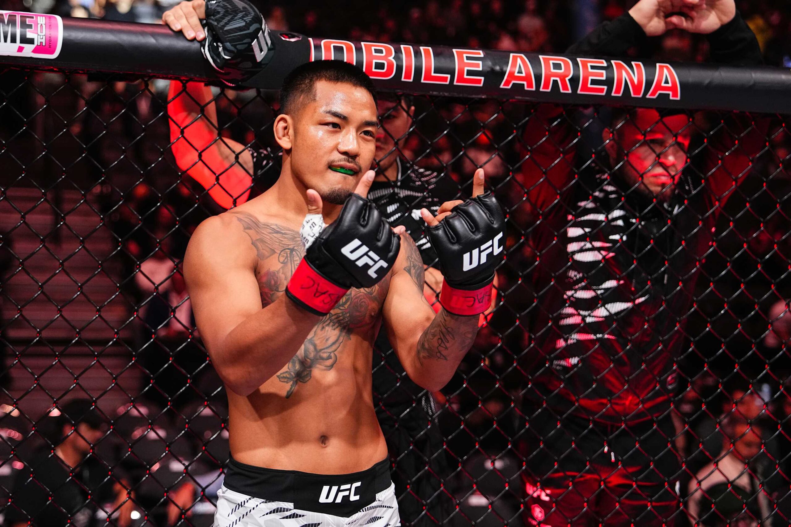 LAS VEGAS, NEVADA - MARCH 08: Joshua Van of Myanmar enters the Octagon in a flyweight fight during the UFC 313 event at T-Mobile Arena on March 08, 2025 in Las Vegas, Nevada.  (Photo by Jeff Bottari/Zuffa LLC)