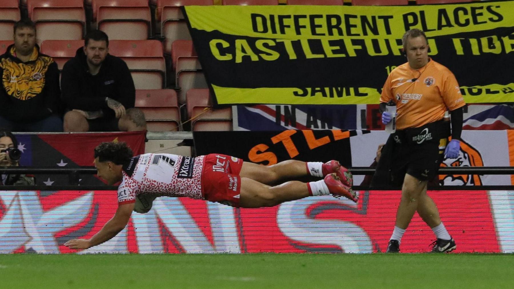 Lachlan Lam playing for Leigh Leopards against Castleford Tigers in Super League rugby