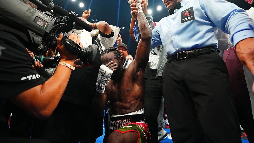 Terence Crawford drops to his knees holding back tears