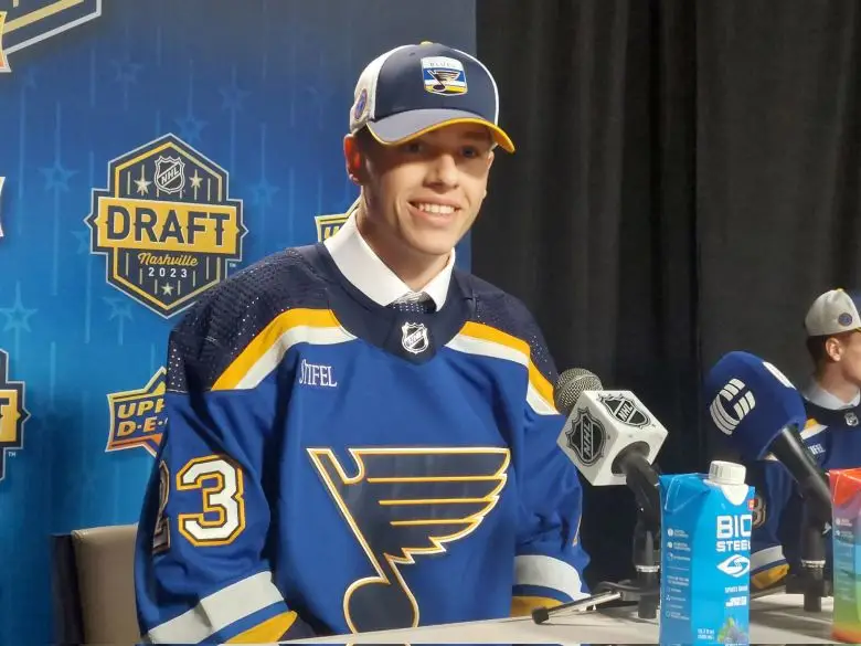 Juraj Pekarcik at the podium in the interview room in Nashville at the 2023 NHL Draft.
