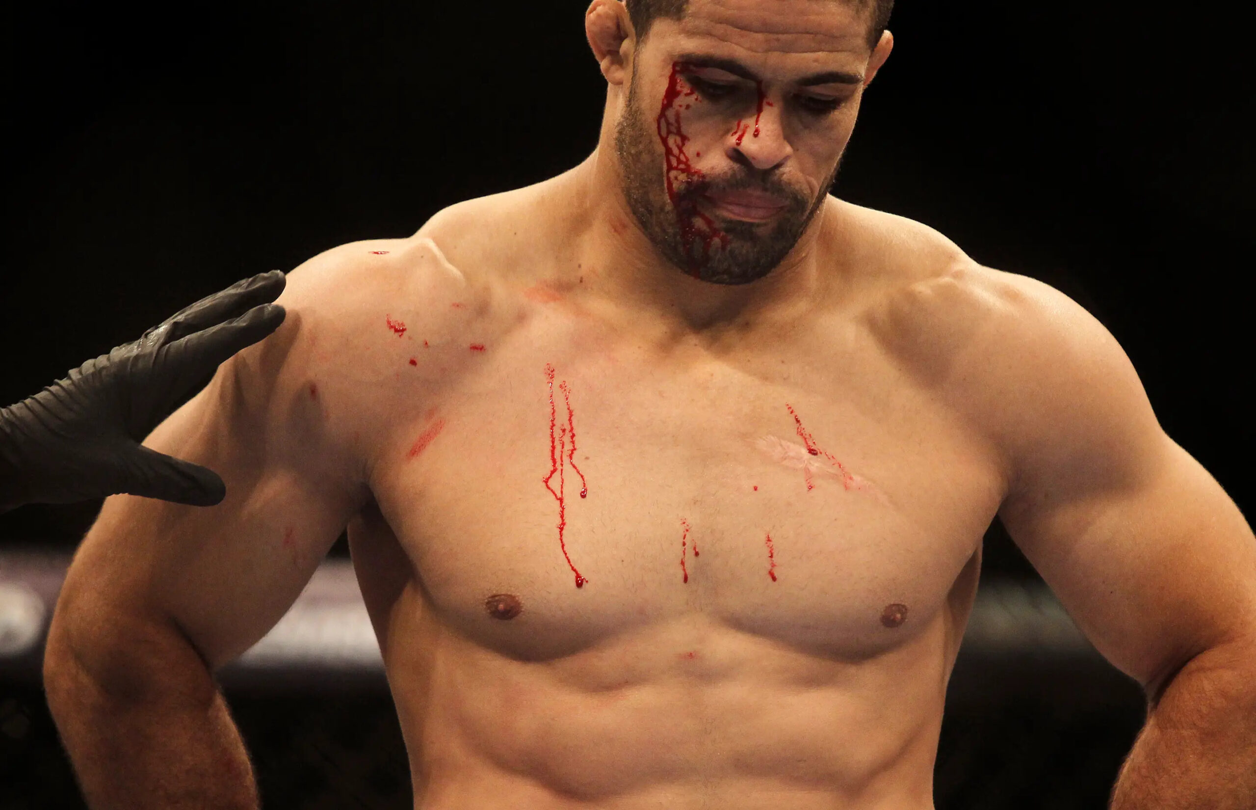 Brazil's UFC (Ultimate Fighting Championship) fighter Rousimar Palhares reacts during a fight with Dan Miller of the U.S. during the UFC RIO, a MMA (professional mixed martial arts) competition in Rio de Janeiro August 27, 2011. REUTERS/Ricardo Moraes (BRAZIL - Tags: SPORT)