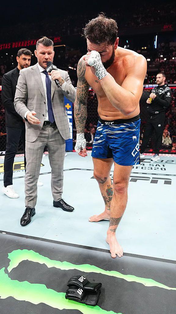 Paul Craig lays down his UFC gloves