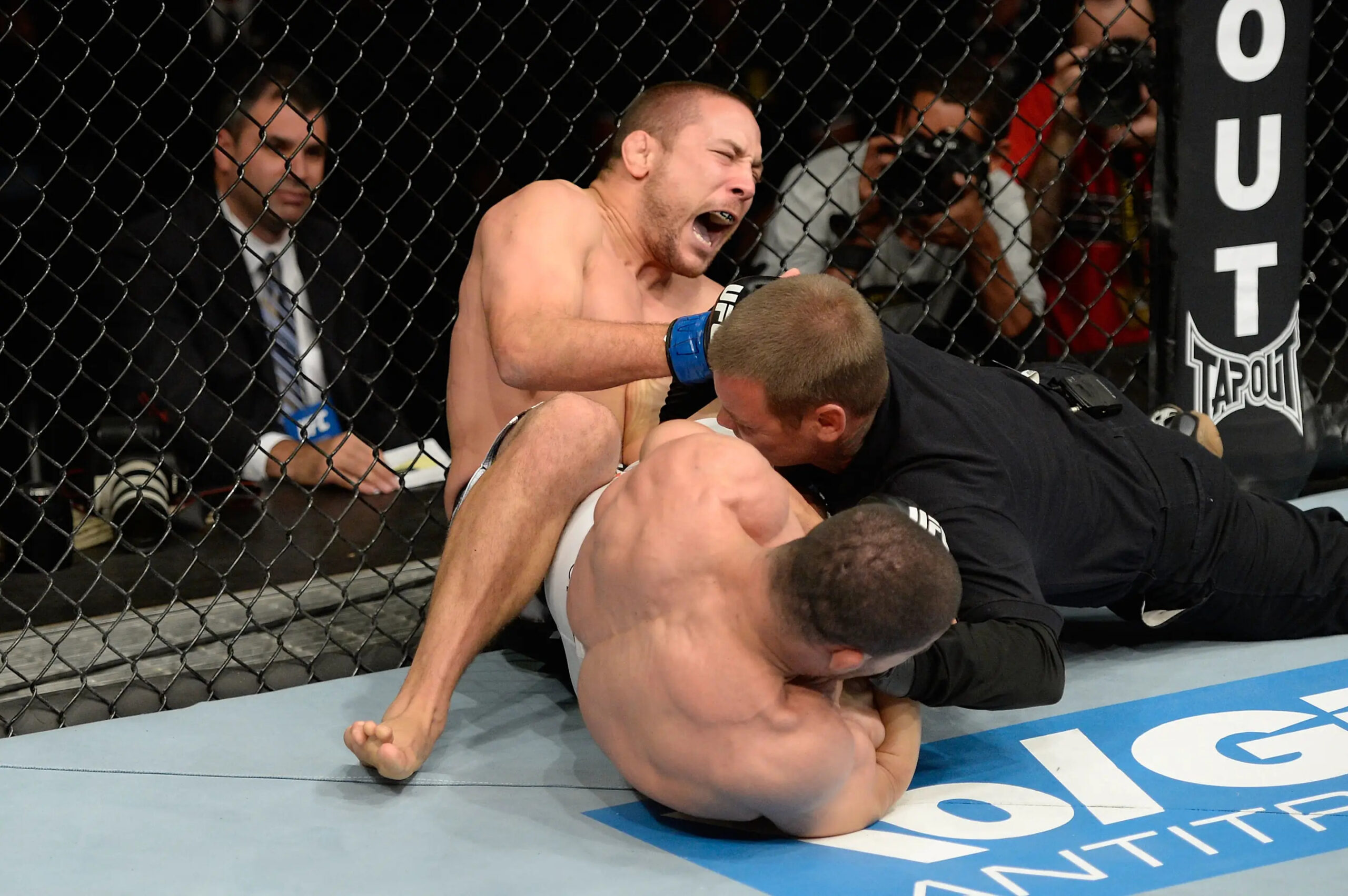 BARUERI, BRAZIL - OCTOBER 9: (L-R) Mike Pierce screams while getting submitted by Rousimar Palhares in their welterweight bout during the UFC Fight Night event at the Ginasio Jose Correa on October 9, 2013 in Barueri, Sao Paulo, Brazil. (Photo by Jeff Bottari/Zuffa LLC/Zuffa LLC via Getty Images)