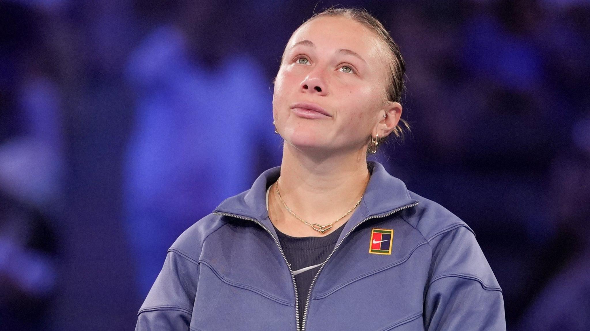 Amanda Anisimova looks up to the roof