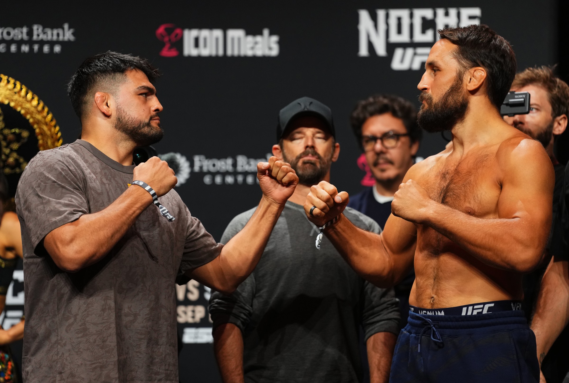 SAN ANTONIO, TEXAS - SEPTEMBER 12: (L-R) Opponents Kelvin Gastelum and Dustin Stoltzfus face off during the Noche UFC ceremonial weigh-in at Frost Bank Center on September 12, 2025 in San Antonio, Texas. (Photo by Cooper Neill/Zuffa LLC via Getty Images)