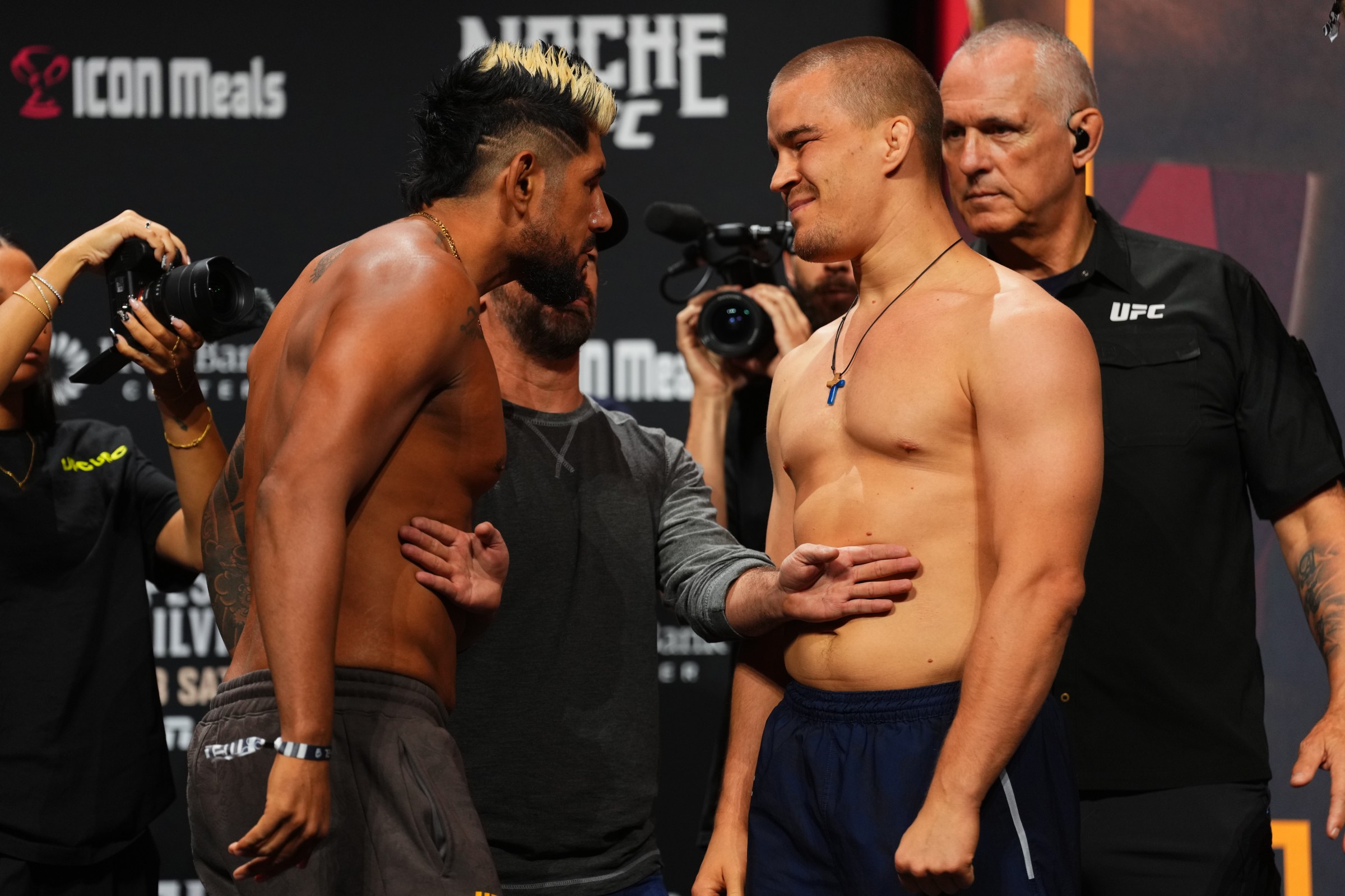 SAN ANTONIO, TEXAS - SEPTEMBER 12: (L-R) Opponents Jose Daniel Medina of Bolivia and Dusko Todorovic of Montenegro face off during the Noche UFC ceremonial weigh-in at Frost Bank Center on September 12, 2025 in San Antonio, Texas. (Photo by Cooper Neill/Zuffa LLC via Getty Images)