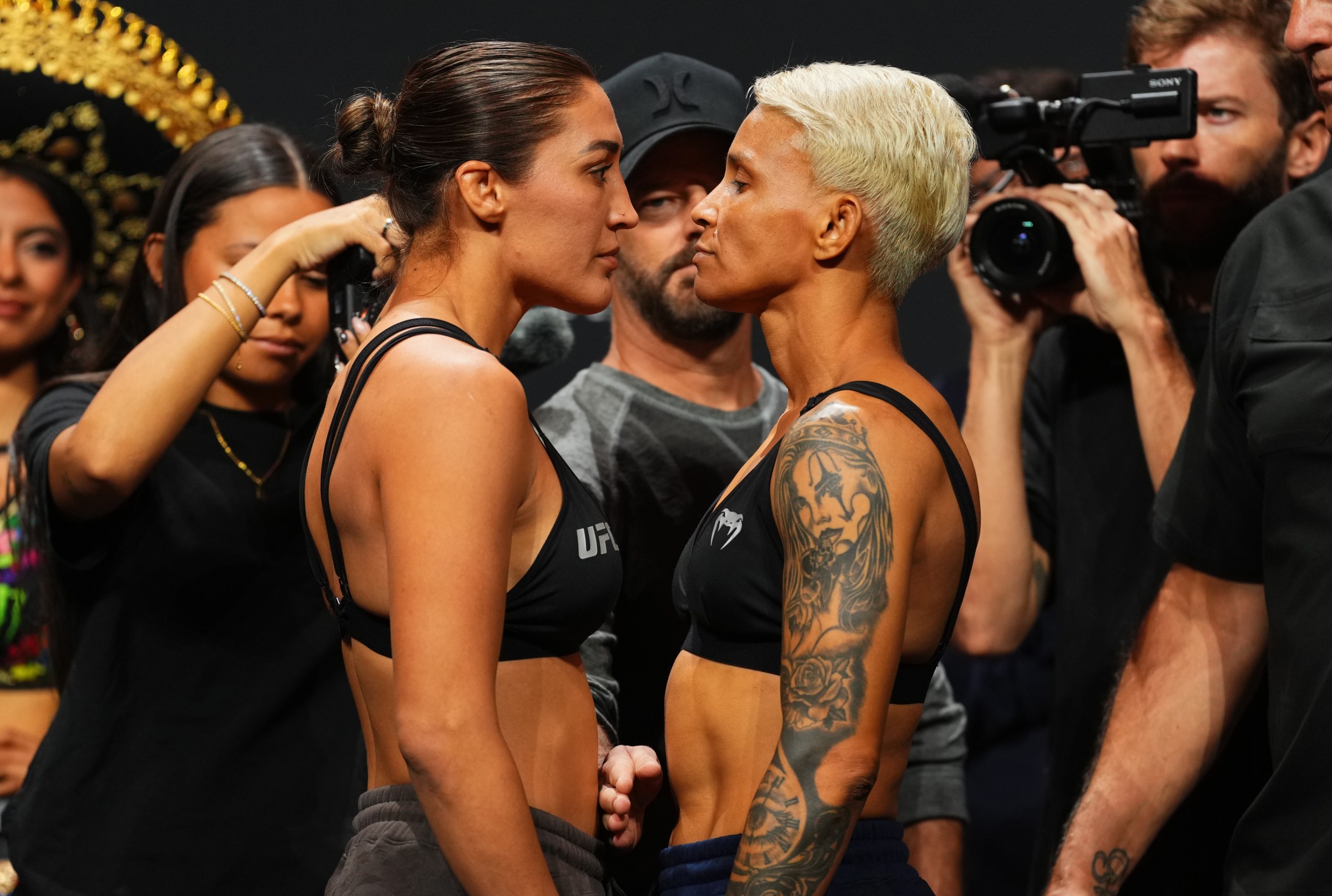 SAN ANTONIO, TEXAS - SEPTEMBER 12: (L-R) Opponents Tatiana Suarez and Amanda Lemos of Brazil face off during the Noche UFC ceremonial weigh-in at Frost Bank Center on September 12, 2025 in San Antonio, Texas. (Photo by Cooper Neill/Zuffa LLC via Getty Images)