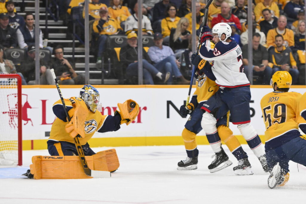 Oct 9, 2025; Nashville, Tennessee, USA; Nashville Predators center Ryan O'Reilly (90) celebrates with his teammates after scoring a goal
