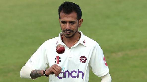 Yuzvendra Chahal throws himself a catch as he prepares to bowl