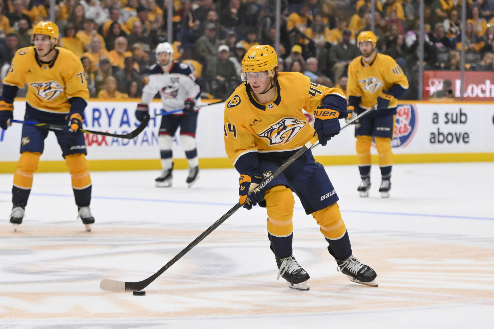 Oct 9, 2025; Nashville, Tennessee, USA; Nashville Predators center Brady Martin (44) skates with the puck against the Columbus Blue Jackets during the second period at Bridgestone Arena. Steve Roberts-Imagn Images