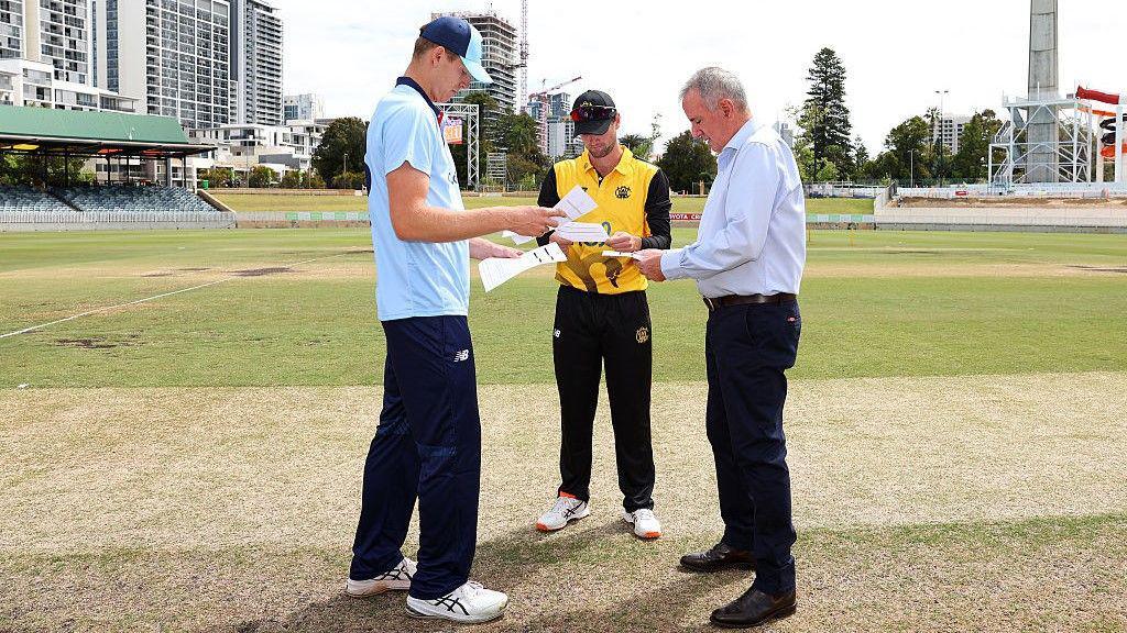 Jack Edwards and Sam Whiteman consult with referee David Gilbert