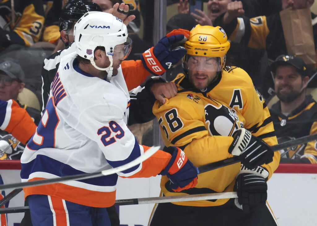 The NHL has started an early crackdown on cross checks to the face. New York Islanders' forward Jonathan