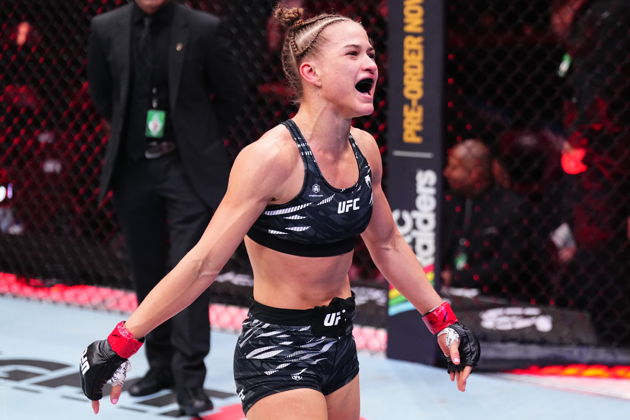 VANCOUVER, BRITISH COLUMBIA - OCTOBER 18: Stephanie Luciano of Brazil reacts after a victory against Ravena Oliveira of Brazil in a strawweight fight during the UFC Fight Night event at Rogers Arena on October 18, 2025 in Vancouver, British Columbia. (Photo by Jeff Bottari/Zuffa LLC)