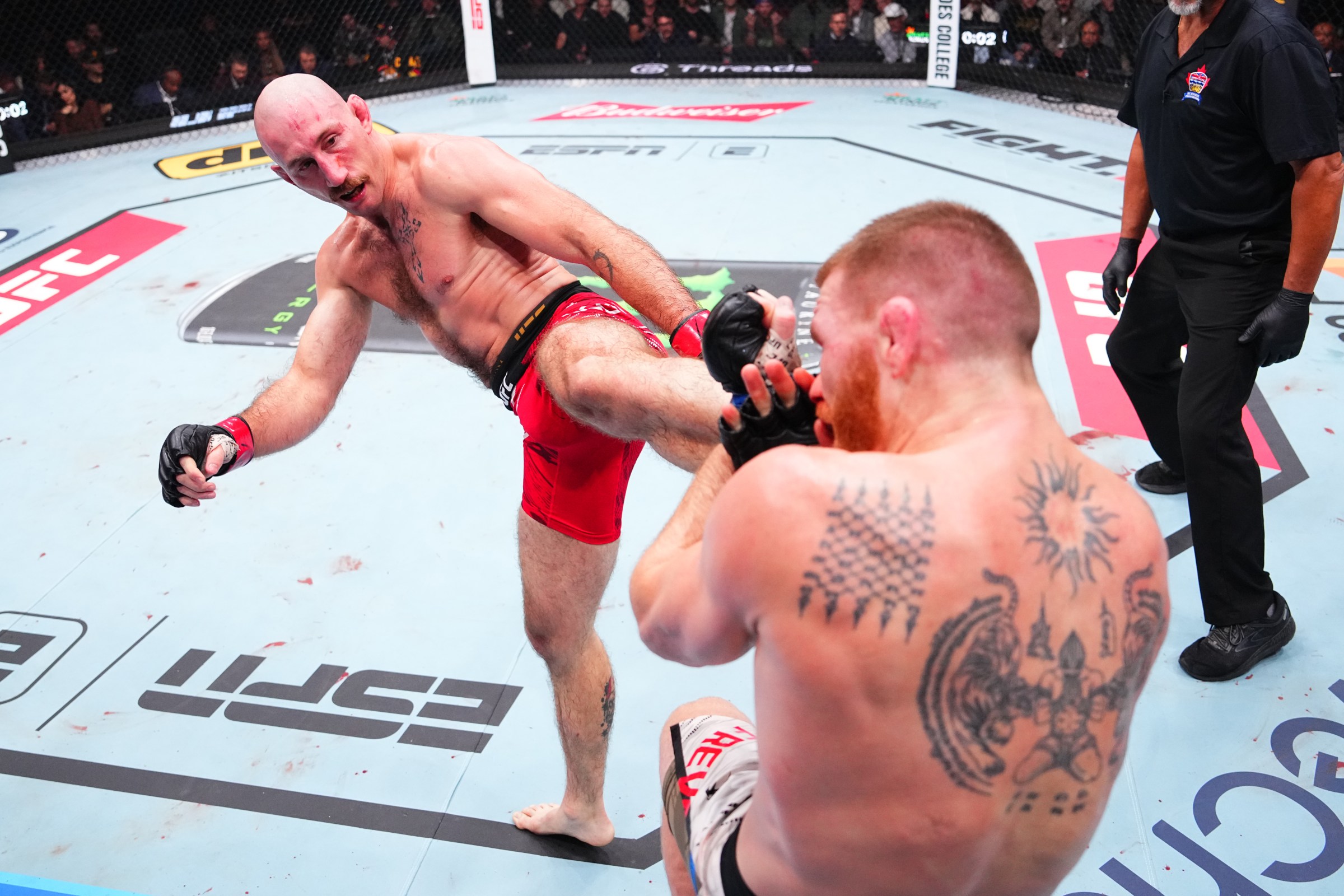 VANCOUVER, BRITISH COLUMBIA - OCTOBER 18: (L-R) Kyle Nelson of Canada kicks Matt Frevola in a lightweight fight during the UFC Fight Night event at Rogers Arena on October 18, 2025 in Vancouver, British Columbia. (Photo by Jeff Bottari/Zuffa LLC)