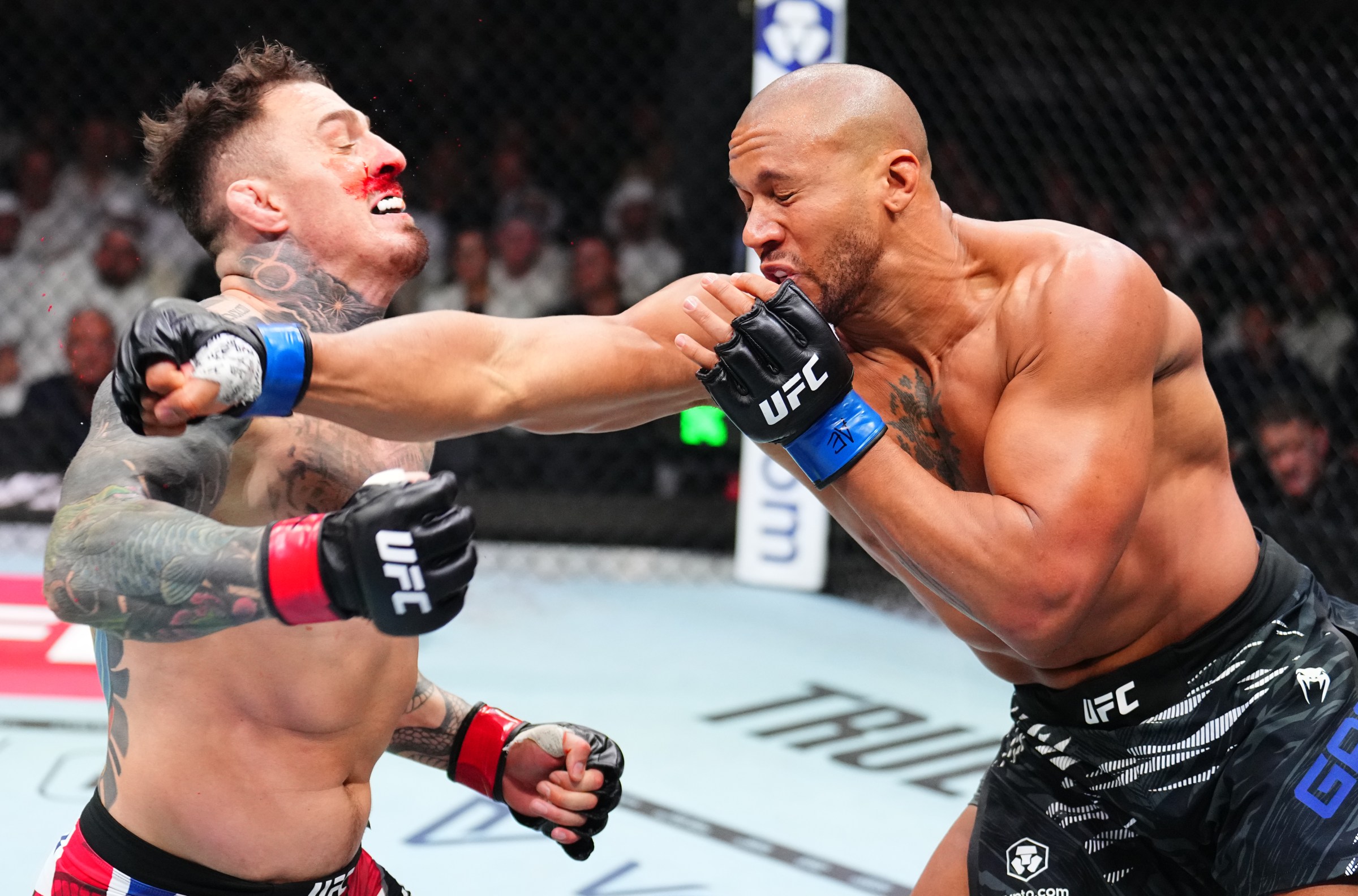 ABU DHABI, UNITED ARAB EMIRATES - OCTOBER 25: (R-L) Ciryl Gane of France punches Tom Aspinall of England in the UFC heavyweight championship fight during the UFC 321 event at Etihad Arena on October 25, 2025 in Abu Dhabi, United Arab Emirates. (Photo by Chris Unger/Zuffa LLC)