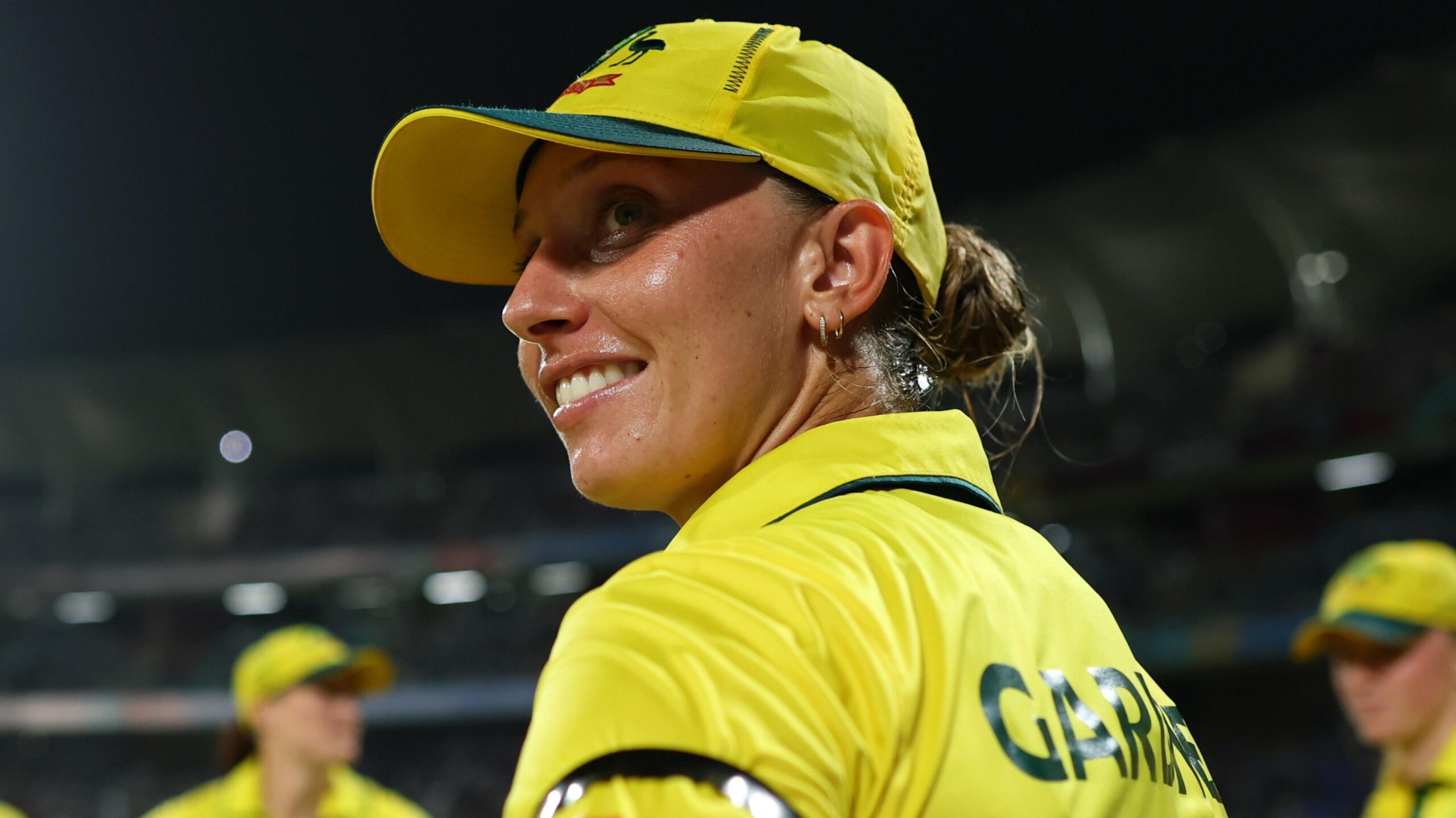 Ash Gardner looks on and smiles