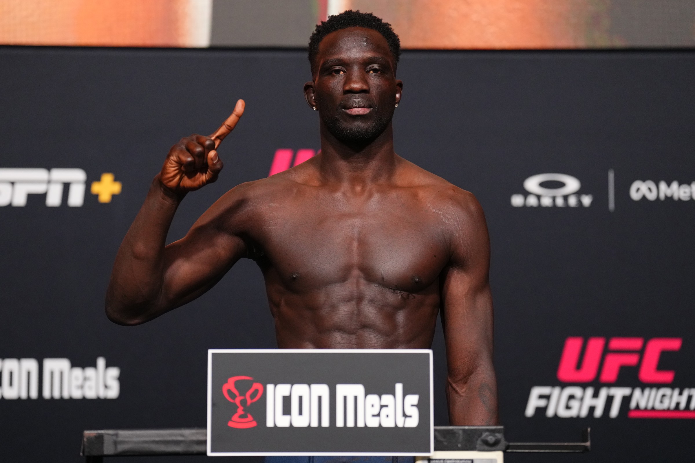 LAS VEGAS, NEVADA - OCTOBER 31: David Onama of Uganda poses on the scale during the UFC Fight Night weigh-in at UFC APEX on October 31, 2025 in Las Vegas, Nevada. (Photo by Chris Unger/Zuffa LLC)