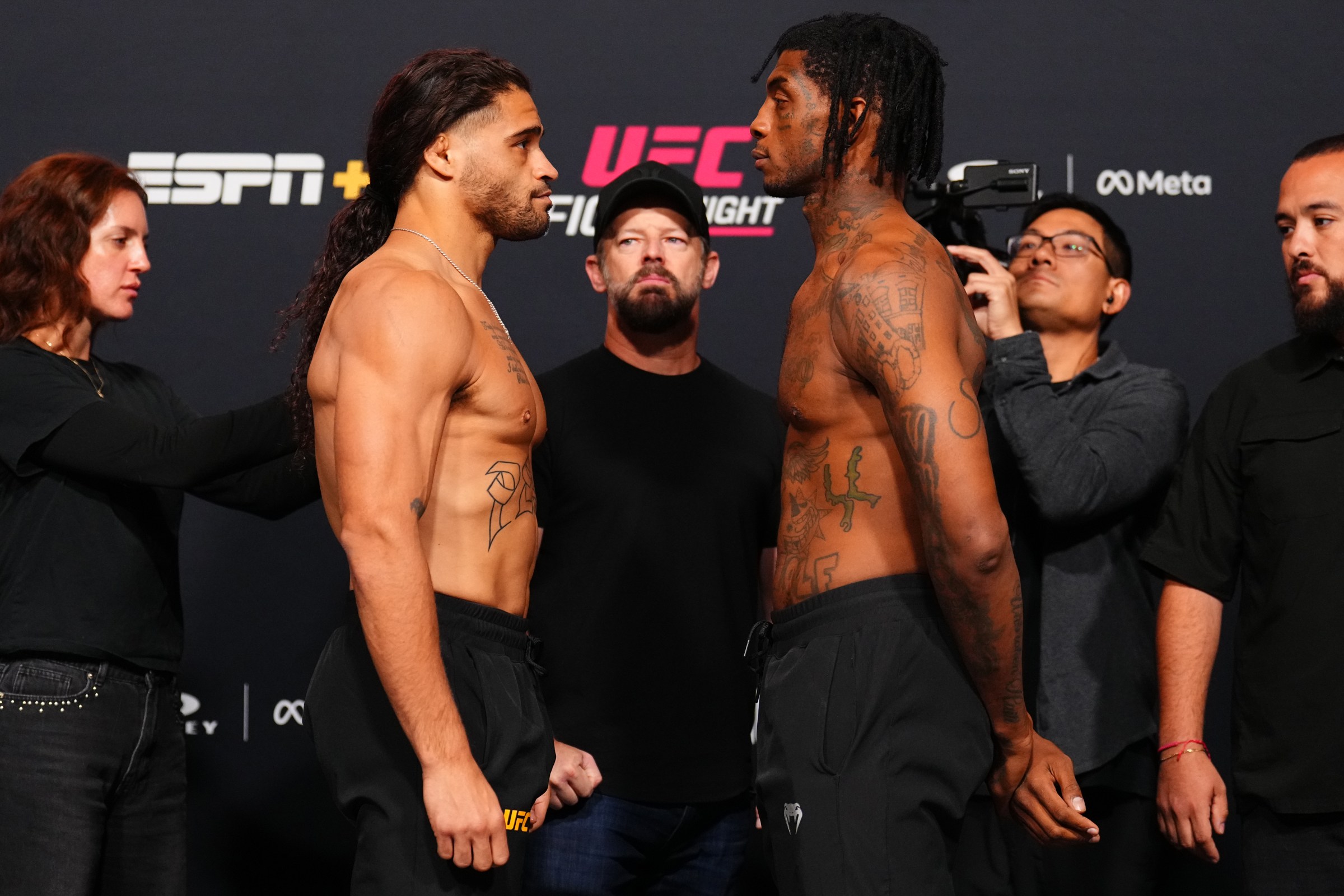 LAS VEGAS, NEVADA - OCTOBER 31: (L-R) Opponents Donte Johnson and Sedriques Dumas face off during the UFC Fight Night weigh-in at UFC APEX on October 31, 2025 in Las Vegas, Nevada. (Photo by Chris Unger/Zuffa LLC)